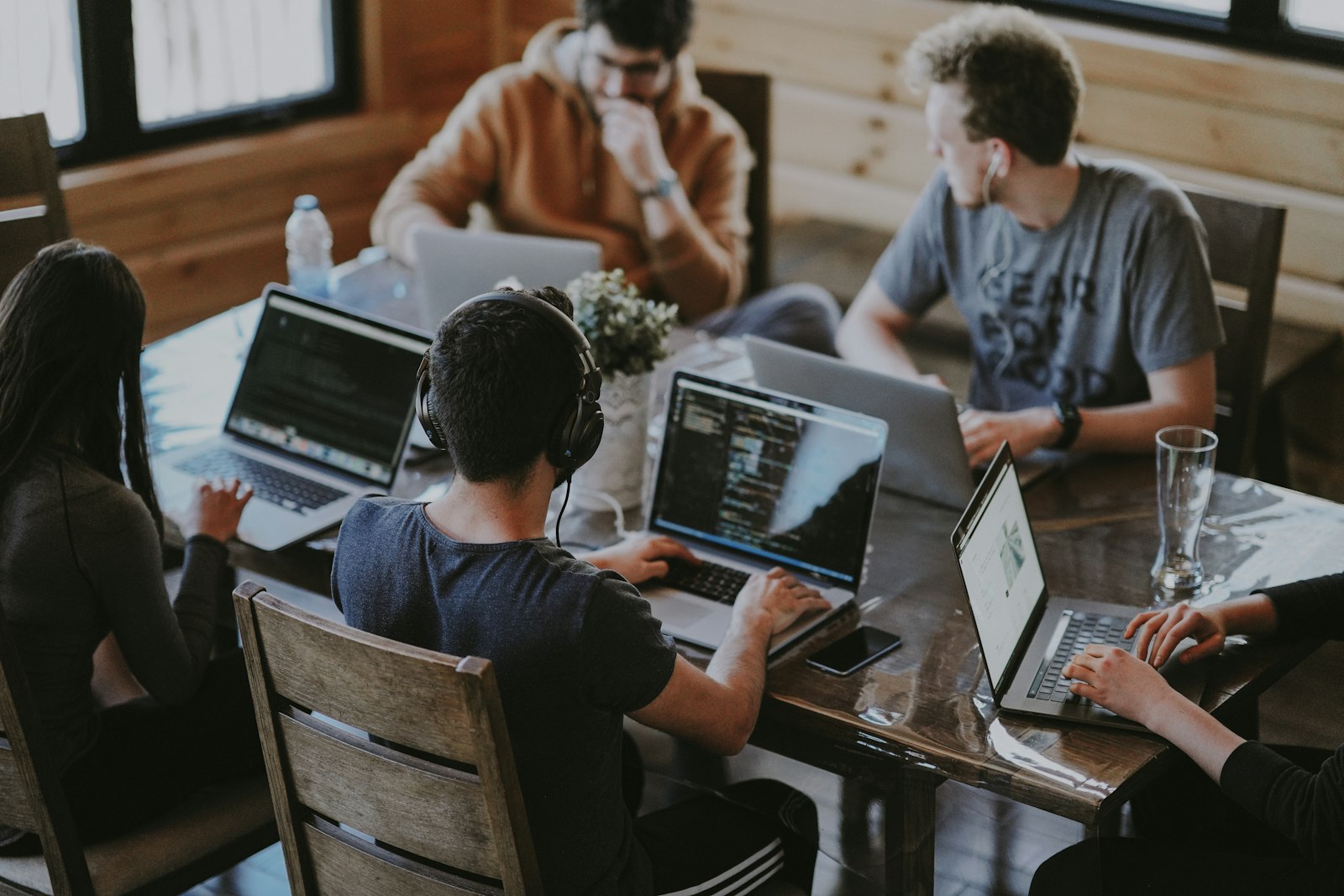Trade team collaborating around a conference table