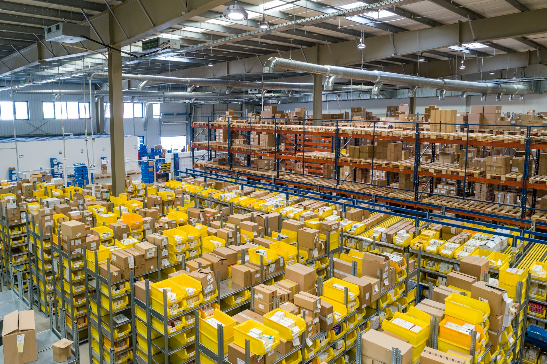 Modern warehouse with stacked shipping cartons