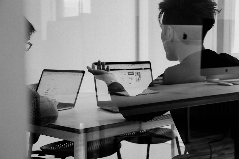 Business professional reviewing documents at a desk